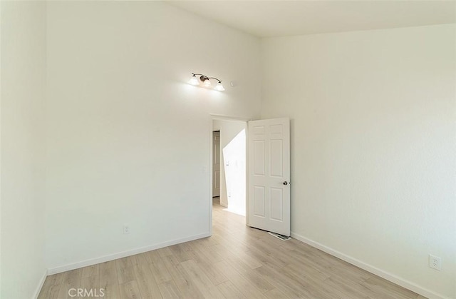 712 E Magill Ave, Fresno, CA 93710 - spare room with light wood-type flooring and baseboards