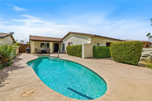 76851 Oklahoma Ave, Palm Desert, CA 92211 - view of swimming pool with a patio