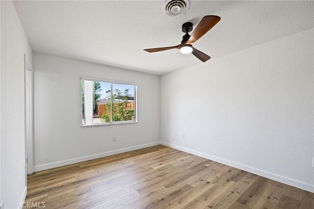 43415 Illinois Ave, Palm Desert, CA 92211 - unfurnished room featuring ceiling fan, light wood-style flooring, and baseboards