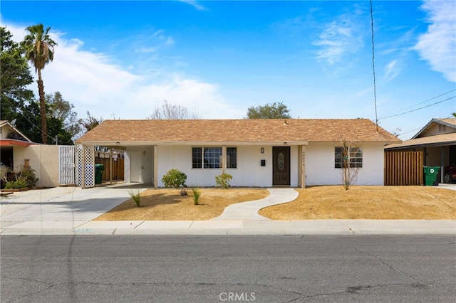 43415 Illinois Ave, Palm Desert, CA 92211 - ranch-style house featuring driveway, a carport, and stucco siding