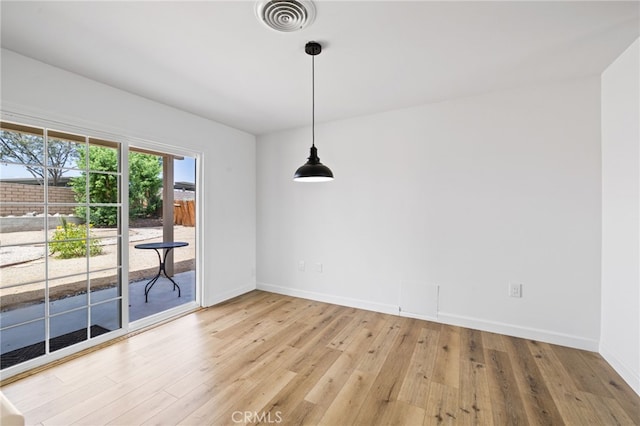 43415 Illinois Ave, Palm Desert, CA 92211 - unfurnished dining area featuring light wood-style floors and baseboards