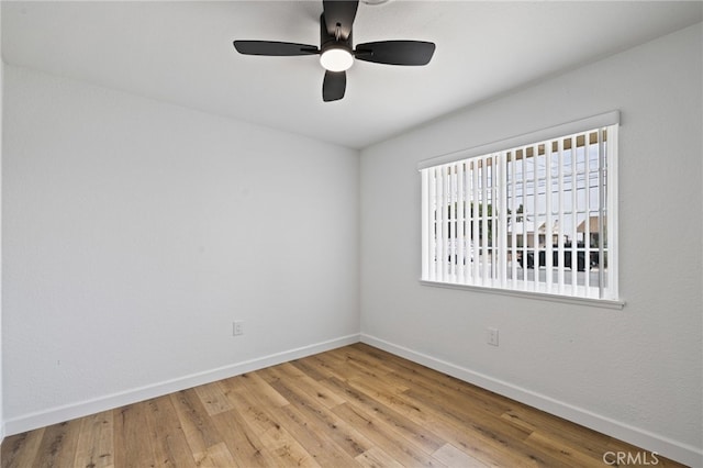 43415 Illinois Ave, Palm Desert, CA 92211 - unfurnished room with baseboards, wood finished floors, and ceiling fan