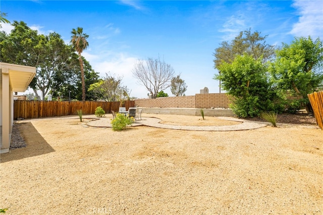 43415 Illinois Ave, Palm Desert, CA 92211 - fenced backyard featuring a patio area