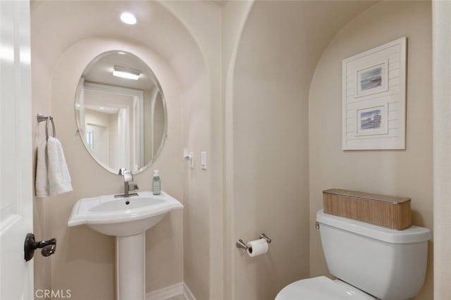 bathroom featuring toilet