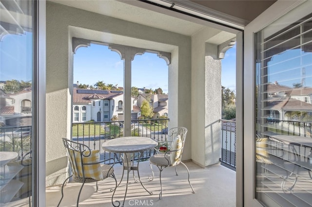balcony featuring a residential view