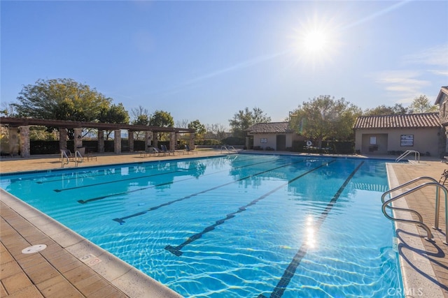 community pool featuring a patio