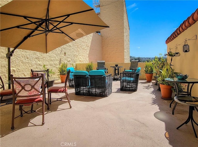 24055 Paseo Del Lago W Unit 1455, Laguna Woods, CA 92637 - view of patio with an outdoor living space and fence