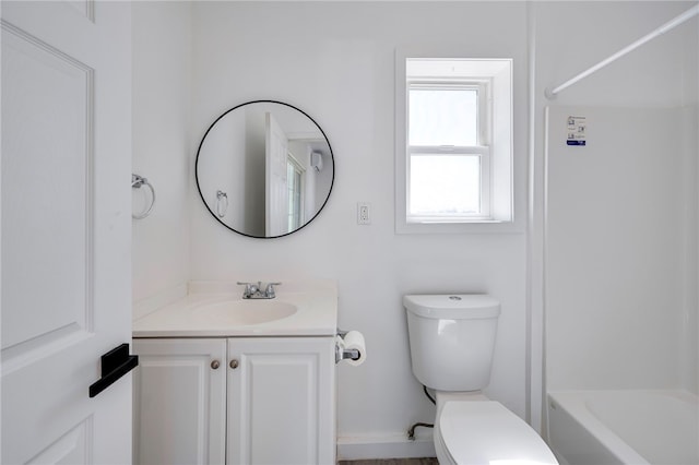 full bathroom with toilet, vanity, and tub / shower combination