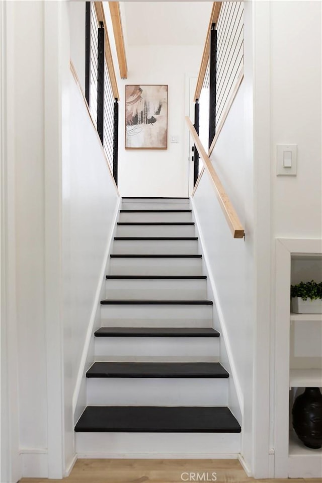 5106 O Sullivan Dr, Los Angeles, CA 90032 - stairway with plenty of natural light and wood finished floors