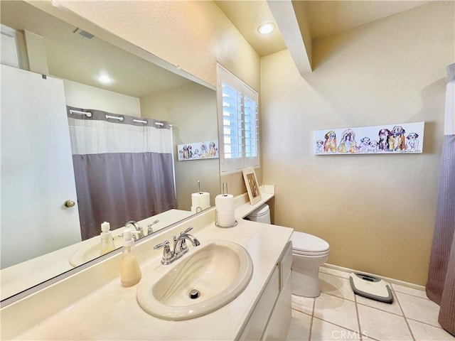 full bath featuring a shower with curtain, tile patterned flooring, vanity, baseboards, and toilet