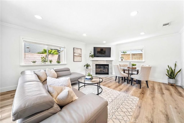 22287 Modina, Laguna Hills, CA 92653 - living room with ornamental molding, a fireplace, baseboards, light wood-style floors, and recessed lighting