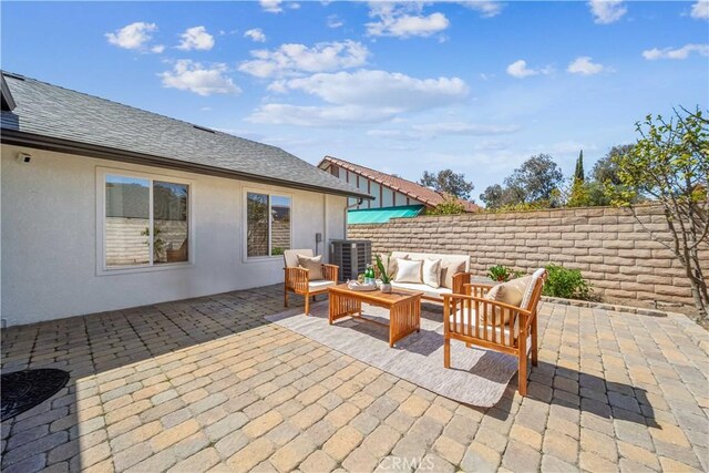 22287 Modina, Laguna Hills, CA 92653 - view of patio featuring an outdoor hangout area and central air condition unit