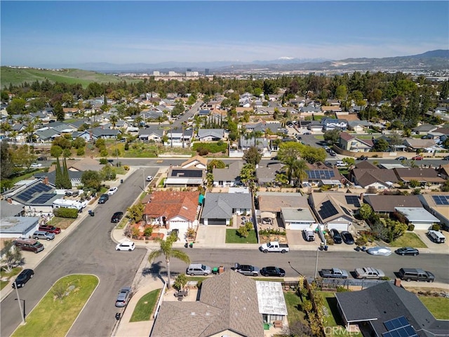 22287 Modina, Laguna Hills, CA 92653 - aerial view of property and surrounding area featuring nearby suburban area and mountains