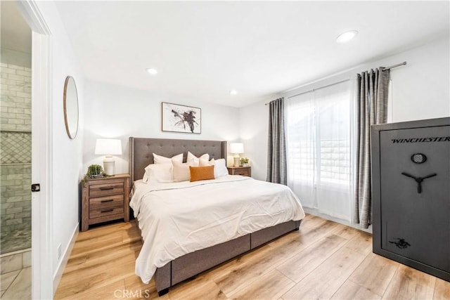 22287 Modina, Laguna Hills, CA 92653 - bedroom with light wood finished floors and recessed lighting