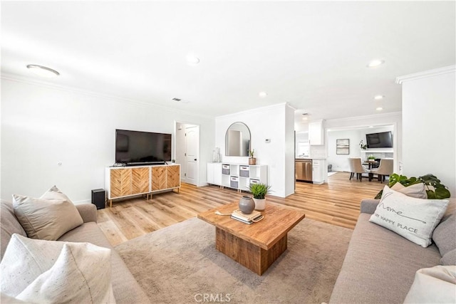 22287 Modina, Laguna Hills, CA 92653 - living room with crown molding, light wood-type flooring, and recessed lighting