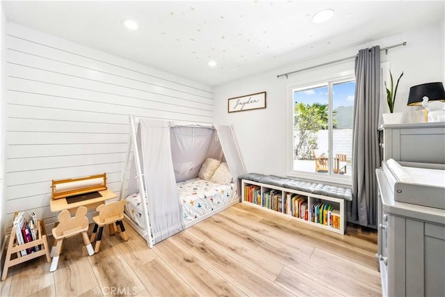 22287 Modina, Laguna Hills, CA 92653 - bedroom featuring light wood-type flooring, recessed lighting, and wooden walls