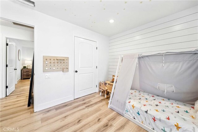 22287 Modina, Laguna Hills, CA 92653 - bedroom featuring light wood-style floors, recessed lighting, and a closet