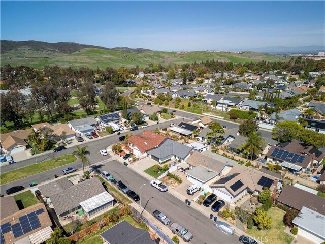 22287 Modina, Laguna Hills, CA 92653 - aerial view of property and surrounding area with nearby suburban area and mountains