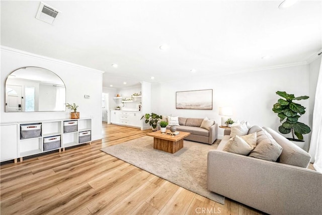22287 Modina, Laguna Hills, CA 92653 - living area with crown molding, light wood-style flooring, recessed lighting, and baseboards