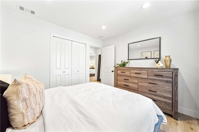22287 Modina, Laguna Hills, CA 92653 - bedroom with light wood finished floors, baseboards, recessed lighting, and a closet