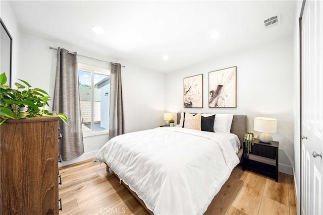 22287 Modina, Laguna Hills, CA 92653 - bedroom featuring light wood-style flooring, baseboards, recessed lighting, and access to outside