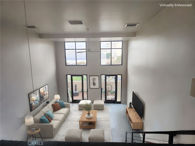 101 W Mission Blvd Unit 306, Pomona, CA 91766 - living room with a high ceiling and carpet