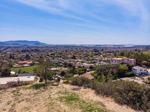 bird's eye view featuring a residential view and a mountain view