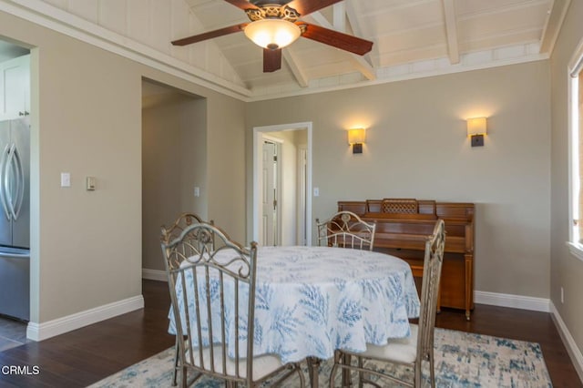 interior space featuring vaulted ceiling with beams, wood finished floors, baseboards, and ceiling fan