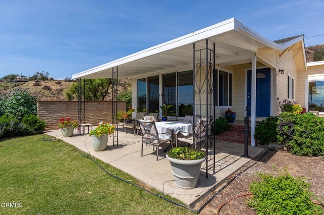 view of patio / terrace with fence
