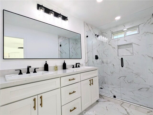 67685 Verona Rd, Cathedral City, CA 92234 - bathroom with double vanity, marble finish floor, a sink, and a marble finish shower