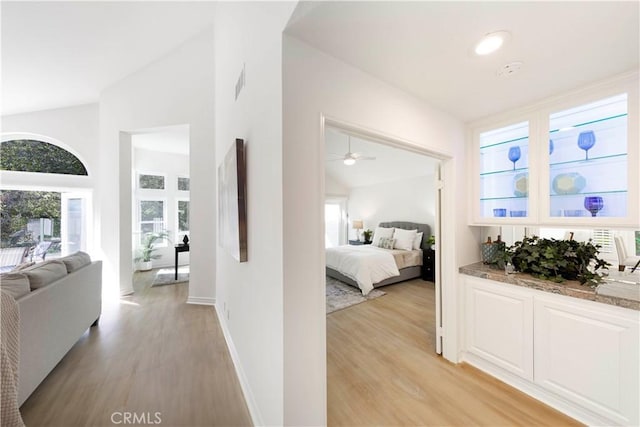 4 Malaquita, Coto De Caza, CA 92679 - hallway featuring vaulted ceiling, visible vents, and light wood-style flooring