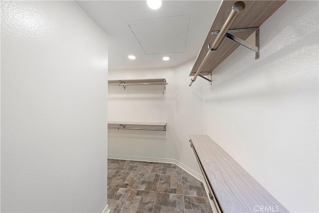 4 Malaquita, Coto De Caza, CA 92679 - spacious closet with stone finish floor and attic access