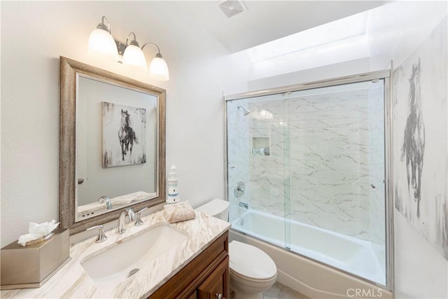 4 Malaquita, Coto De Caza, CA 92679 - full bathroom featuring toilet, vanity, combined bath / shower with glass door, and visible vents