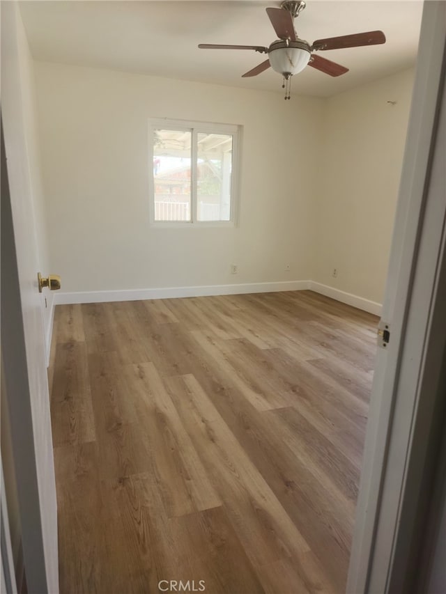 7524 Matterhorn Ave, Rancho Cucamonga, CA 91730 - empty room with light wood-style floors and ceiling fan
