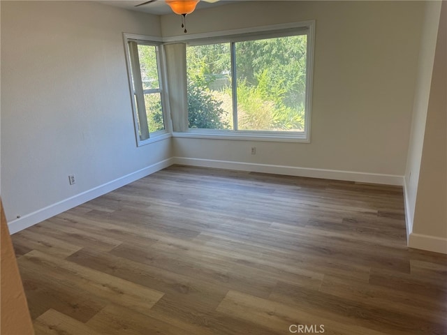 7524 Matterhorn Ave, Rancho Cucamonga, CA 91730 - spare room featuring wood finished floors and a ceiling fan