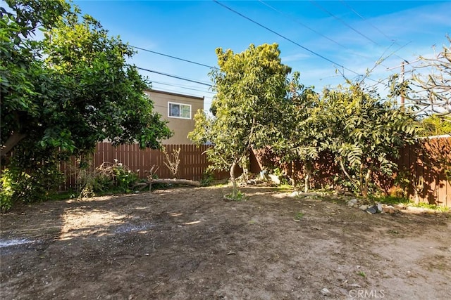 view of yard featuring fence