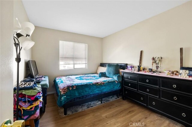 bedroom featuring light wood-type flooring