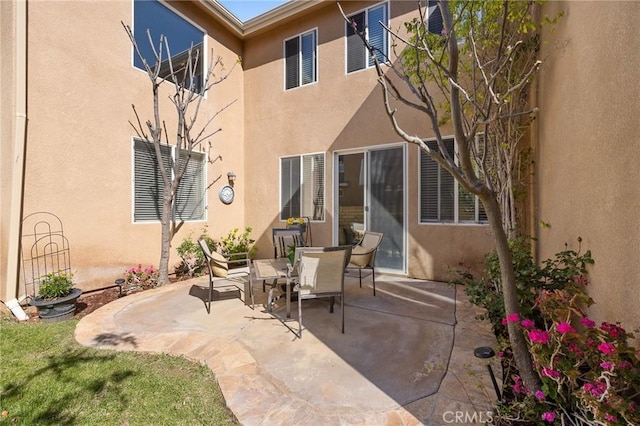 view of patio with outdoor dining space