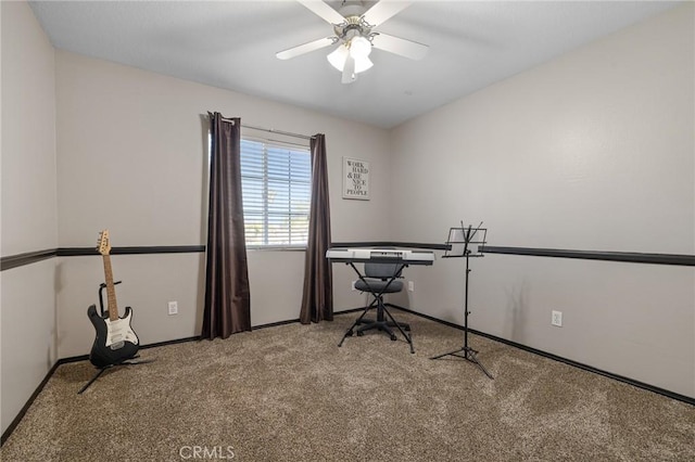 interior space with ceiling fan and baseboards