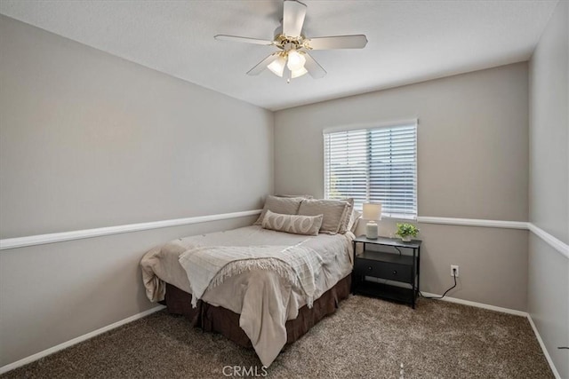 bedroom featuring carpet floors, baseboards, and a ceiling fan