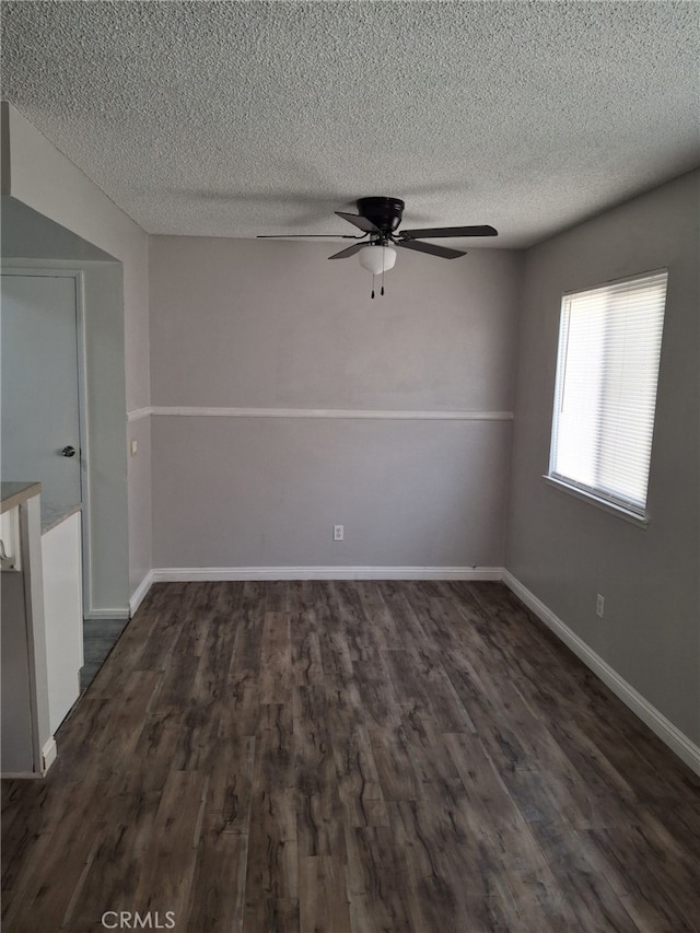 3408 20th St, Highland, CA 92346 - unfurnished room with dark wood-style flooring, ceiling fan, a textured ceiling, and baseboards