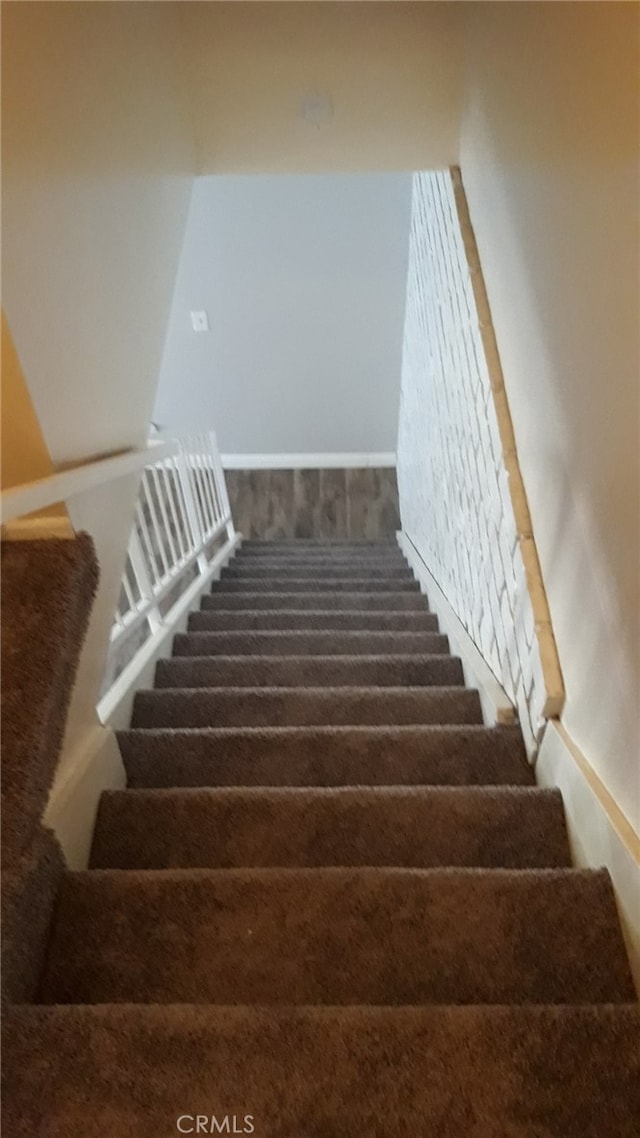 3408 20th St, Highland, CA 92346 - stairs featuring carpet flooring and baseboards