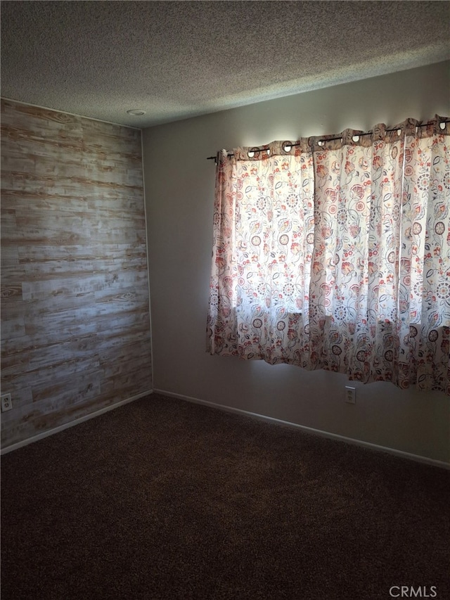 3408 20th St, Highland, CA 92346 - carpeted empty room with a textured ceiling and baseboards
