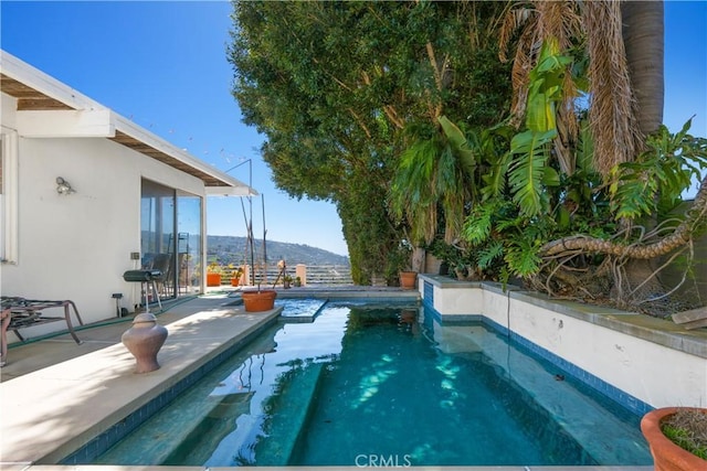 1223 Skyline Dr, Laguna Beach, CA 92651 - swimming pool with a patio and a mountain view
