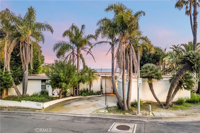 1223 Skyline Dr, Laguna Beach, CA 92651 - view of front of house featuring driveway and stucco siding