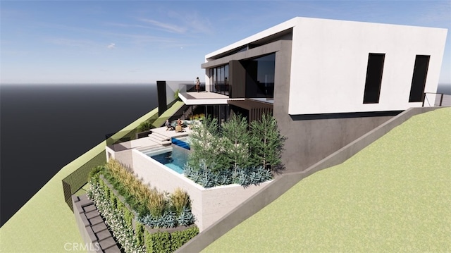 1223 Skyline Dr, Laguna Beach, CA 92651 - view of property exterior with a balcony, stucco siding, and a water view
