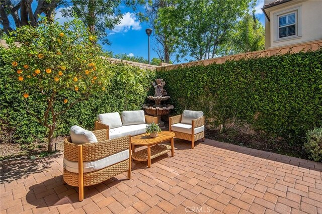 37 Fanpalm, Irvine, CA 92620 - fenced backyard with a patio area and an outdoor living space