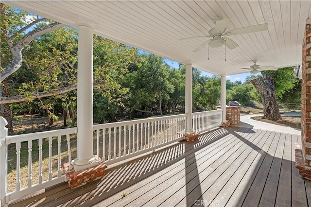 45325 Via Vaquero, Temecula, CA 92590 - wooden deck with a ceiling fan, view of wooded area, and a porch