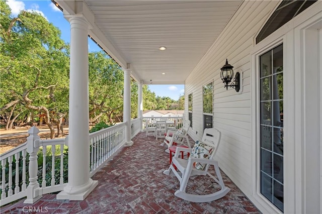 45325 Via Vaquero, Temecula, CA 92590 - view of patio with covered porch and view of wooded area