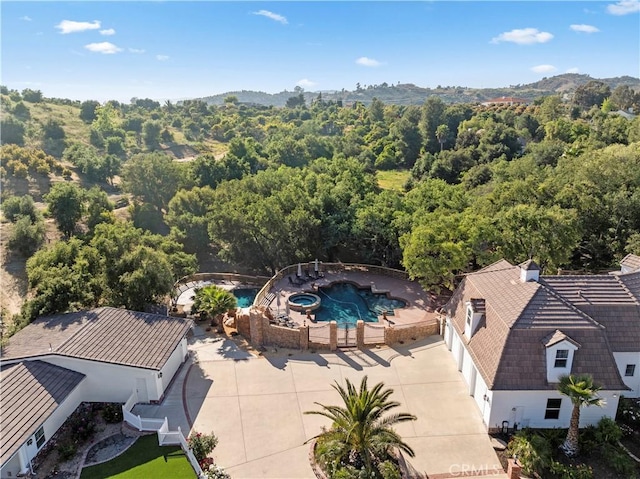 45325 Via Vaquero, Temecula, CA 92590 - view from above of property featuring a pool, a heavily wooded area, and a mountainous background